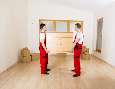 Organized storage unit in Pimlico with boxes and furniture